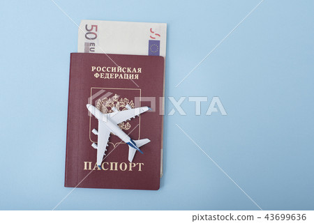 Airplane on the cover of a Russian passport. Euro Airplane on the cover of a Russian passport. Euro 43699636