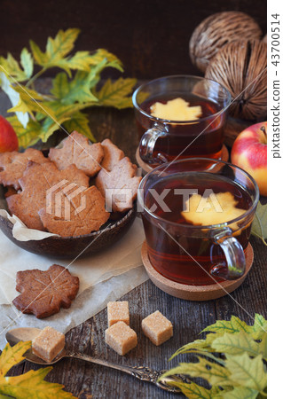 Autumn mood: cinnamon cookies and two cups of tea 43700514