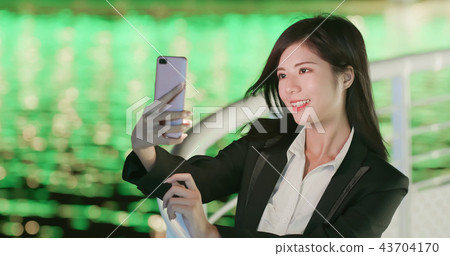 woman selfie happily 43704170