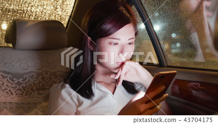 woman use phone work woman use phone work 43704175