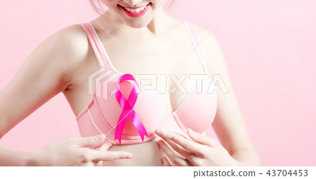 woman show pink ribbon 43704453