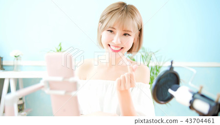 woman having live stream 43704461