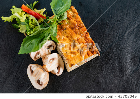 vegetable casserole on black background vegetable casserole on black background 43708049