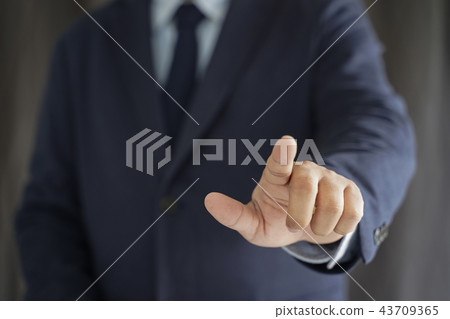 Business man hold the smartphone on the street Business man hold the smartphone on the street 43709365