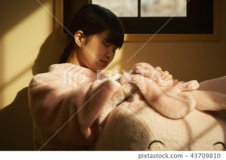 Girl doing part-time job in amusement park 43709810