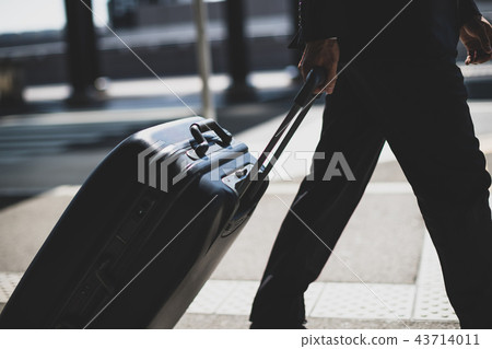 business trip, business man, a suitcase 43714011