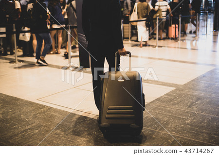 airport, business man, a suitcase 43714267