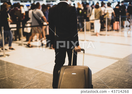 airport, business man, a suitcase 43714268