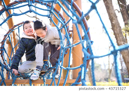 Children playing in the park 43715327