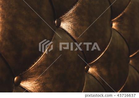 Surface of a rhombic split skin with buttons on the back of the bed. Rhombic patterns of bulk skin 43716637