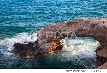 Stone arch known as the Love bridge 43717312