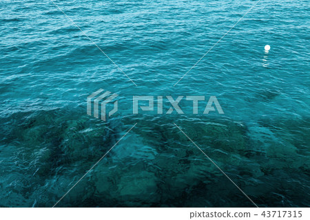 Deep blue water of Mediterranean Sea 43717315