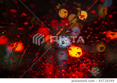 Raindrops on windshield and bokeh lights  43718549