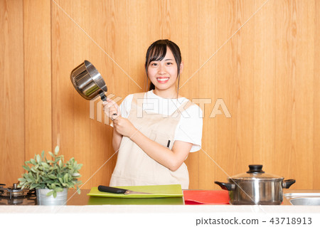 Girl in apron 43718913