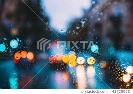Rain Water Drops On Blue Glass Background In Night Or Evening St Rain Water Drops On Blue Glass Background In Night Or Evening St 43720968