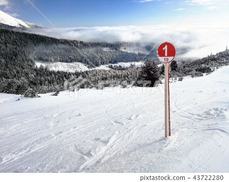 Red ski route 1 sign on fresh snow Red ski route 1 sign on fresh snow 43722280