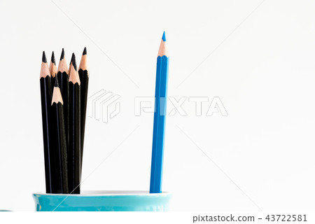 Blue pencil separated in blue cup with among black 43722581