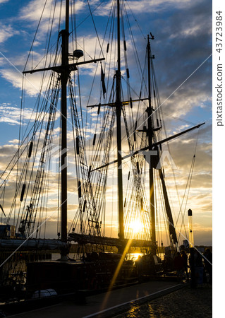 Mast and rope sailboat vessel on sunset background 43723984