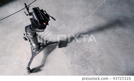 Portable tripod for video camera with dolly wheel 43725328