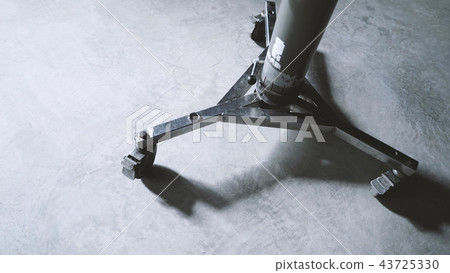 Portable tripod for video camera with dolly wheel 43725330
