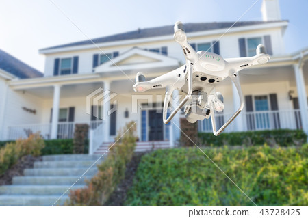 Drone Quadcopter Inspecting, Photographing House Drone Quadcopter Inspecting, Photographing House 43728425