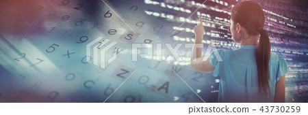 Composite image of rear view of businesswoman touching imaginary screen 43730259