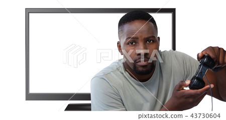 Composite image of man playing video game against white background 43730604