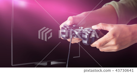 Composite image of woman playing video game against white background 43730641