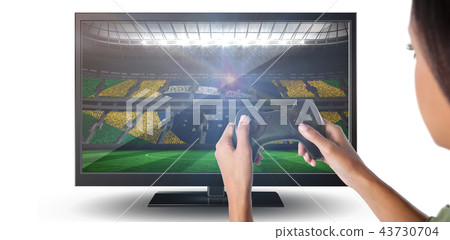 Composite image of woman playing video game against white background 43730704