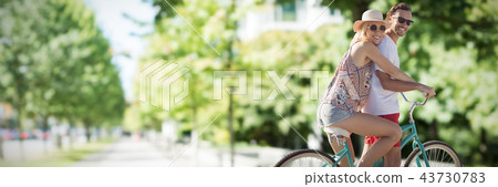 Composite image of cute couple on a bike ride digital composite image Composite image of cute couple on a bike ride digital composite image 43730783