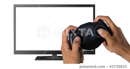 Composite image of cropped image of hands holding controller 43730835