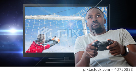 Composite image of man playing video game against white background 43730858