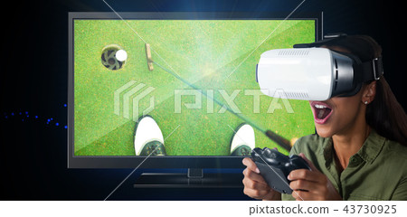 Composite image of woman playing video game with virtual reality headset 43730925