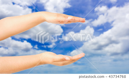 human hand gesture something with sky background human hand gesture something with sky background 43734768