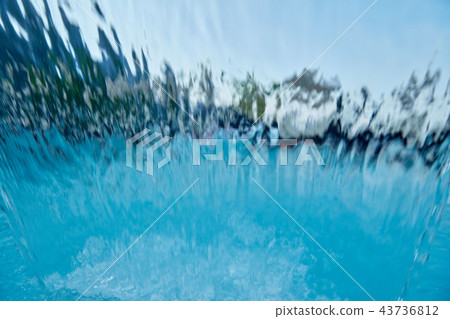 Blurred swimming pool waterfall. Abstract background Blurred swimming pool waterfall. Abstract background 43736812