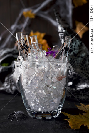 Original cocktail in a glass tube for Halloween party Original cocktail in a glass tube for Halloween party 43738485