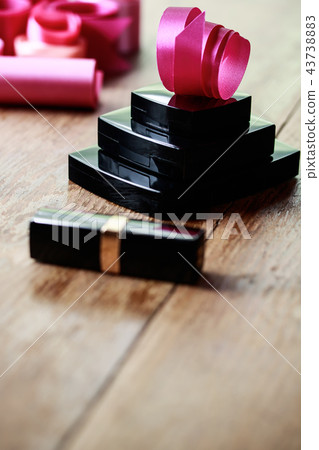 Ribbon and cosmetics 43738883