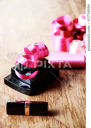 Ribbon and cosmetics 43738894