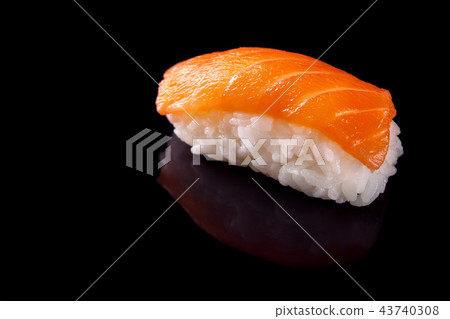 Macro shot of sushi on dark backgorund Macro shot of sushi on dark backgorund 43740308