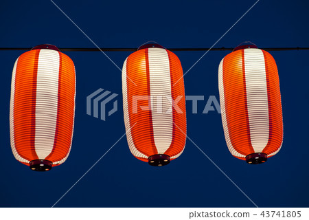 Orange paper lanterns strung in a line on festival Orange paper lanterns strung in a line on festival 43741805