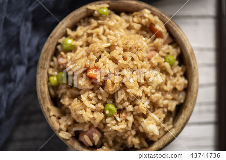 Chinese fried rice in a boxwood bowl Chinese fried rice in a boxwood bowl 43744736