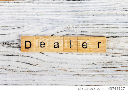 DEALER word made with building blocks concept 43745127
