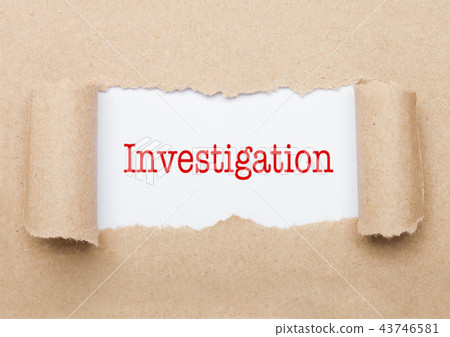 Investigation text appearing behind brown paper 43746581