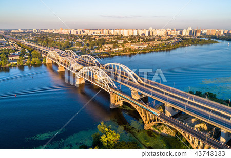 Kiev Urban Train on the Darnytsia Bridge across the Dnieper in Ukraine 43748183