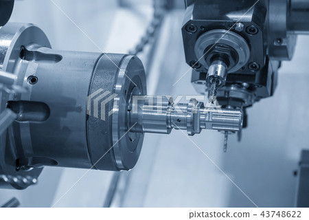 The CNC lathe machine. 43748622