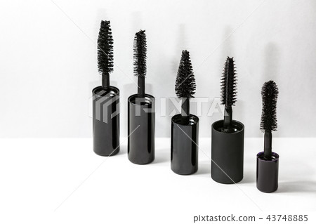Set of mascara brushes standing in a row Set of mascara brushes standing in a row 43748885