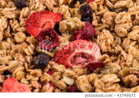 Muesli oat cereals close up with dry fruits 43749871
