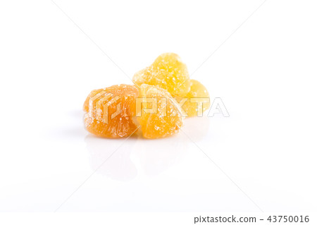 heap of sweat Candied ginger isolated on white heap of sweat Candied ginger isolated on white 43750016