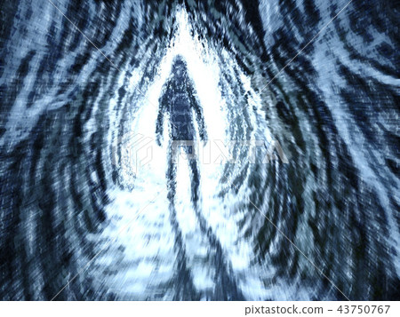 Silhouette stands at entrance to the cave. 43750767