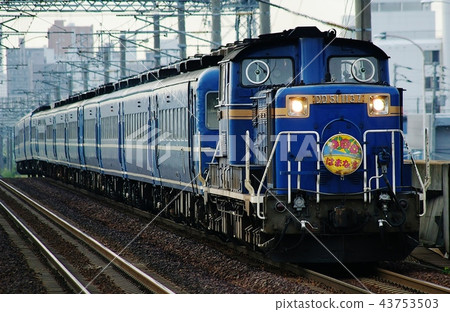 Express train passing Inazumikoen Station is a transit train Express train passing Inazumikoen Station is a transit train 43753503